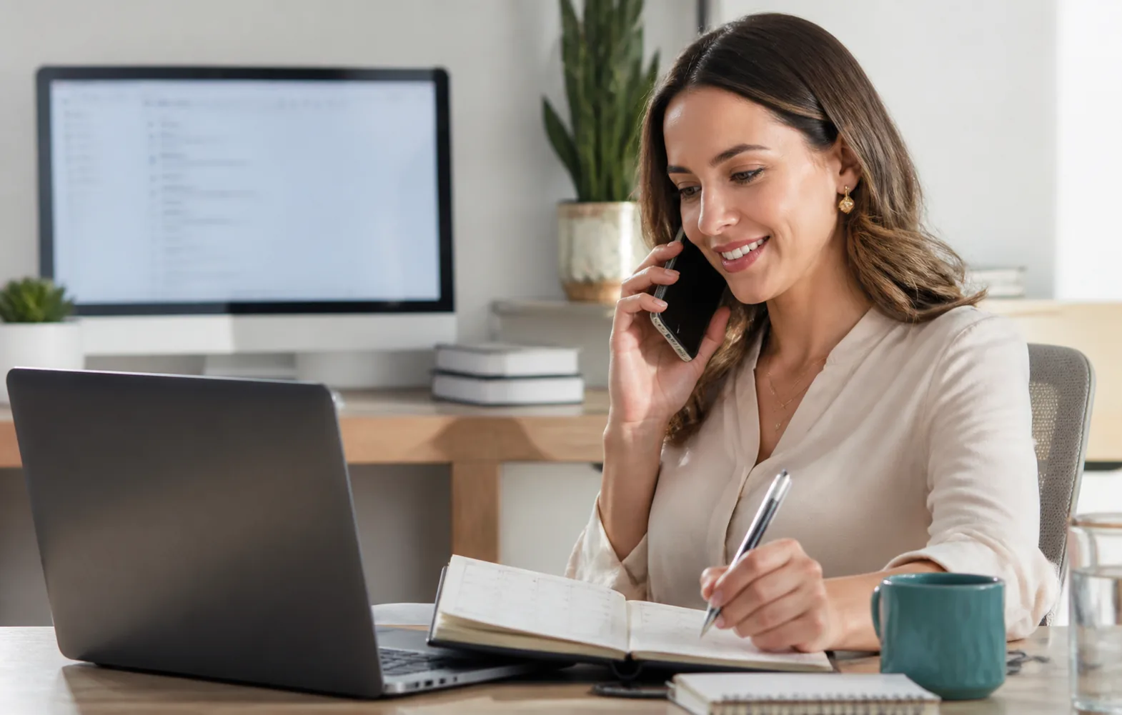 Virtual assistant coordinating calls, notes, and calendar work in a clean office